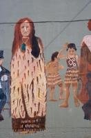 A full wall mural depicting the cultures of the maori people in Opunake, Taranaki, New Zealand.