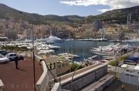 The marina overlooked by Monte Carlo, Monaco draws many luxury yachts during the hot summer months of the Mediterranean.
