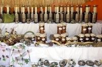 A display of an assortment of souvenirs available at a market stall along the cobbled lane in the village of Karlstein in the Czech Republic in Europe.