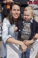 A mother with her child at the Maibaumfest in Putzbrunn, Germany.