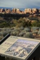 An interpretive sign explaining the geology of the Needles in Canyonlands National Park, Utah.