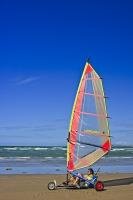 A great outdoor activity along Orewa Beach on the East Coast of the North Island of New Zealand is land sailing.