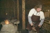 A viking blacksmith preparing tools