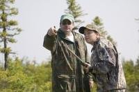 Stock photo of a guide giving Hunting Tips at Tuckamore Lodge Newfoundland