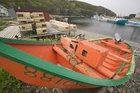A local fisherman leaves his fishing boat on the shore in Newfoundland, Canada.