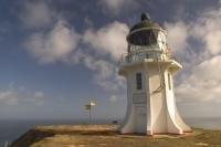 Cape Reinga lighthouse is situated at the very northern tip of the North Island of New Zealand where the Pacific Ocean and Tasman Sea meet.