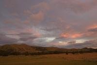 Sunset over a typically New Zealand landscape near Masterton on the North Island of New Zealand.