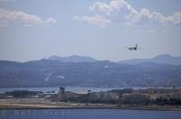 A plane prepares for landing at the Nice Airport in Provence, France in Europe.
