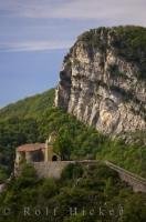 The historic site of the Notre Dame de la Menour situated in Col de Brouis in Alpes Maritimes, Provence, France is surrounded by natural bush and rugged hills.