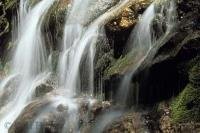 A pristine waterfall from a stream in the Cape Breton Highlands National Park of Nova Scotia in Canada.