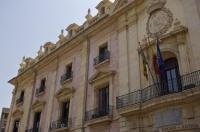 The Palacio de Justicia in the city of Valencia, Spain was a building which was originally built as a customs house for sea trade.