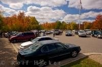 The parking lot at the West Gate of Algonquin Provincial Park in Ontario, Canada can become fairly busy during the Autumn season.