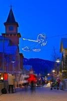 These people at the Whistler Village Ski Resort in British Columbia are taking a walk through the decorative lighting display along the Village Stroll just as dusk is setting in.
