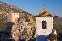 Pictures of the church belfry and the castle ruins in Guadalest in the Province of Alicante in Comunidad Valenciana, Spain, taken on a beautiful clear day.