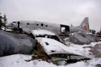 Covered in the winter ice, the remains of the plane wreck known as Miss Piggy sits near the Hudson Bay in Churchill, Manitoba.