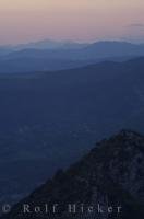 The mountains of the Serre de Montdenier are silhouetted as dusk falls over the Provence, France.