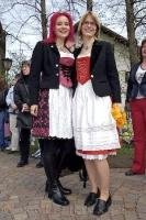 Ladies get dressed up in their dirndls for the Maibaumfest in Putzbrunn, Germany.