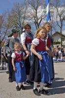 A family goes out for the day to the Maibaumfest in Putzbrunn, Germany.