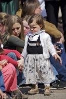 A young girl dressed in a dirndl during the Maibaumfest in Putzbrunn, Germany.