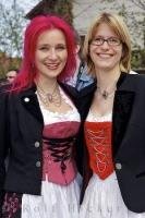 Two ladies enjoy the Maibaumfest celebrations in Putzbrunn, Germany.