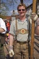 A traditionally dressed man at the Maibaumfest in the village of Putzbrunn, Southern Bavaria, Germany.
