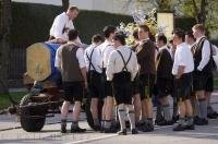 A team of men get ready to haul the Maibaum into the town centre in Putzbrunn, Germany.