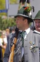 A member of the local hunting club marching with his rifle in Putzbrunn, Germany.