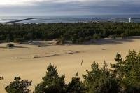 The view of sand dunes and coastline at the Umpqua River Lighthouse along the Oregon Coast in the USA.
