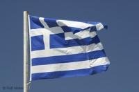 greek flag against blue flag