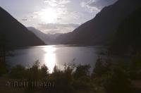 The sun sets over beautiful Seton Lake in the province of BC in Canada, a popular vacation destination for nature lovers and visitors.