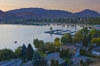 The picture shows a view of the Skaha Park and Marina, a vacation spot on the shores of Skaha Lake at sunset in Penticton, British Columbia, Canada.