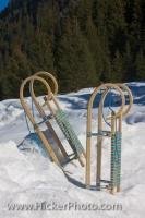 Two toboggans rest in the snow in the Wildgerlos Valley in the Salzburger Land in Austria, Europe.