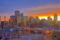 Calgary, faces some very harsh Alberta winters, but one of the beautiful things about winter is the magnificent sunsets that can occur after light snowfall where bright colours reflect from the heavy clouds above the city s