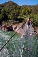 The swingbridge across the Buller River on the West Coast of the South Island of New Zealand is the longest in the whole of New Zealand and is a popular tourist attraction for visitors looking for a thrill.