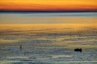 The sun sets over the Tokeland tidal flats near Willapa Bay in Washington, USA.