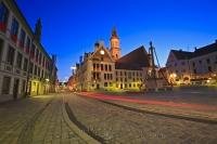 The Town Square, the Marienplatz, of Freising in Bavaria, Germany at dusk shows a variety of interesting lighting effects.