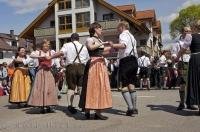 Dressed in traditional clothing this group of dancers performed during the Bavarian Maibaumfest in Putzbrunn, Germany.