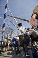 These poles are used as part of the Maibaum raising at this traditional European festival in Putzbrunn, Germany.