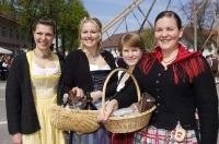 Ladies dressed in traditional German dresses called Dirndls at the Maibaumfest in Putzbrunn, Germany.