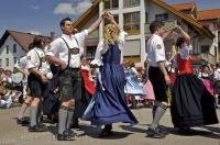 Residents of Putzbrunn perform a traditional dance at the Maibaumfest.