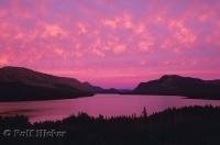 Beautiful scenery and sunsets await at Trout River Pond in Gros Morne National Park in Newfoundland, Canada.