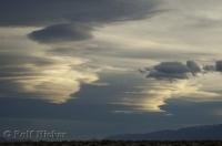 There are many types of clouds which indicate different weather patterns like these ones near Bishop in California.