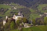 The Tyrolean Castle of Presule guards the plain below the Dolomite mountain Sciliar in the South Tyrol region of Italy.