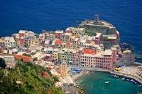 The Cinque Terre in Liguria, Italy is a very extraordinary travel destination, especially the village of Vernazza as seen in this aerial shot.