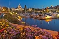 Family Vaction City Victoria in British Columbia. Surrounded by Hotels, the harbour is a part of Victorias Secret which is beauifully lit at night, Vancouver Island.