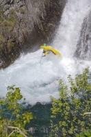 A kayaker makes his way to the bottom of the waterfall known as the Sauth deth Pish in the Pyrenees in Catalonia, Spain in Europe.