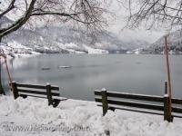 A beautiful scene where fresh snow has blanketed the landscape around Lake Waegitaler near the town of Siebenen in Switzerland, Europe.