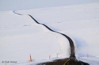 Looks like a road to nowhere, the James Dalton Highway in northern Alaska is a very challenging road, especially in the winter month.