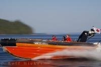 A super fast Zodiac Hurricane in action in the waters off Northern Vancouver Island, British Columbia, Canada.