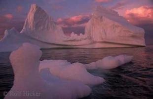 photo of sunset photo floating iceberg